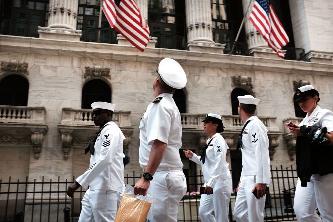 Sailors in New York walk through Lower Manhattan on May 22.