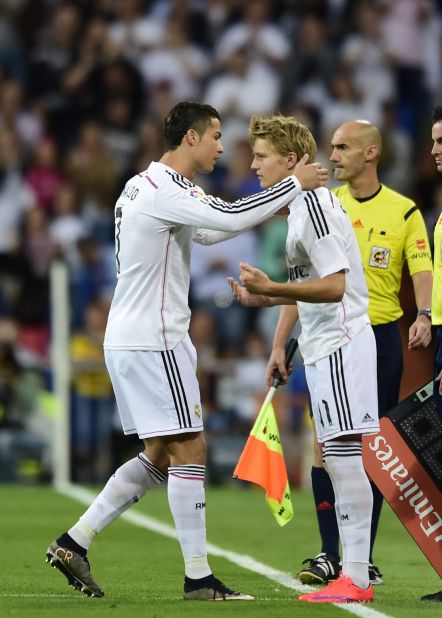 Martin Odegaard became Real Madrid's youngest debutant when he replaced world player of the year Cristiano Ronaldo in the club's final match of the 2014-15 season against Getafe, aged 16 years, five months and six days.