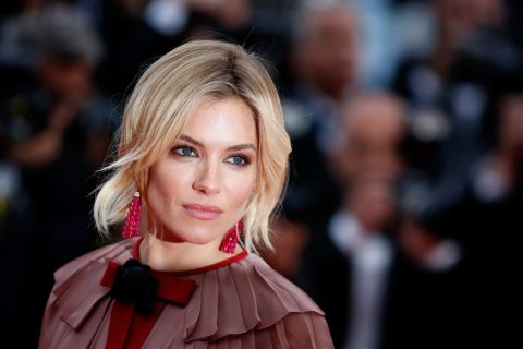 Actress Sienna Miller attends the premiere of "Macbeth." Shakespeare took a hit in the opening credits, relegated to forth place behind the film's three screenwriters.
