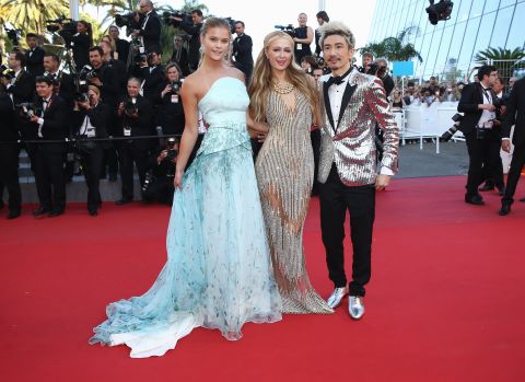 (Left to right) Nina Agdal, Paris Hilton and Sun Zu Yang attend the premiere of "Inside Out" -- a highly-acclaimed film that didn't make the competition.