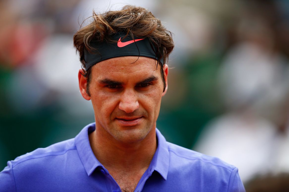 Roger Federer was furious after a fan followed him onto the court and tried to get photos after his opening match of the 2015 French Open. 