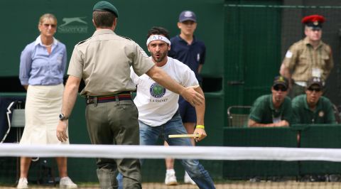 At Wimbledon in 2006, Federer's center-court match against Croatia's Mario Ancic was interrupted by a protester. 