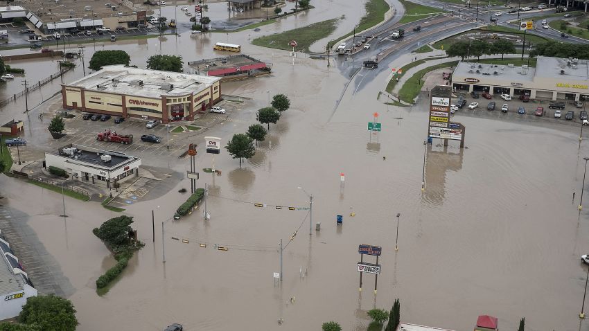 A shopping center submerged in water from the Blanco River flooding in San Marcos,Texas, on Sunday, May 24.