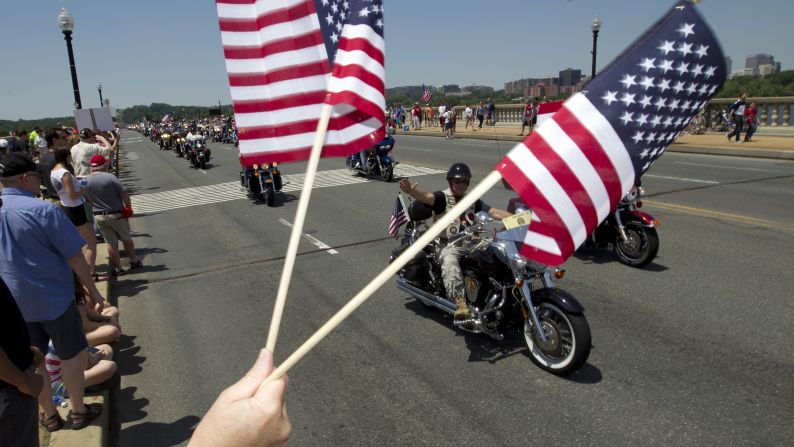 People ride past Arlington Memorial Bridge in Washington during the annual Rolling Thunder motorcycle rally on May 24.