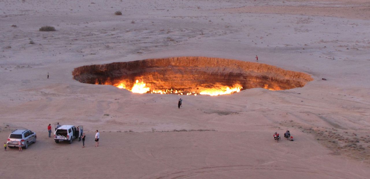 Welcome to "The Gateway to Hell."  This huge burning gas crater in the heart of Turkmenistan's Karakum desert was the result of a simple miscalculation by Soviet scientists in 1971. After their boring equipment drilled into an underground cavern, a deep sinkhole formed. The scientists took the decision to set the pit alight, thinking that the gas would burn out quickly but it never has.