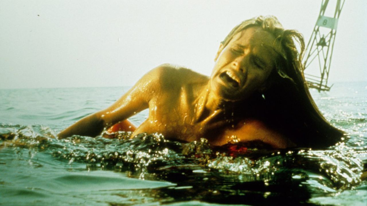Susan Backlinie played Chrissie, the shark's first victim, in the movie's opening scene. Crew members hidden underwater yanked Backlinie back and forth with cables to make it appear like she was being attacked.