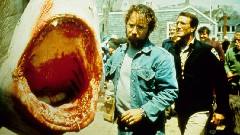 Marine biologist Hooper (Dreyfuss) inspects a captured shark which the resort town hopes is the one that's been terrorizing its waters. Local fisherman had no luck catching a real shark for this scene, so producers had to fly in a dead (and decomposing) 13-foot tiger shark from Florida.