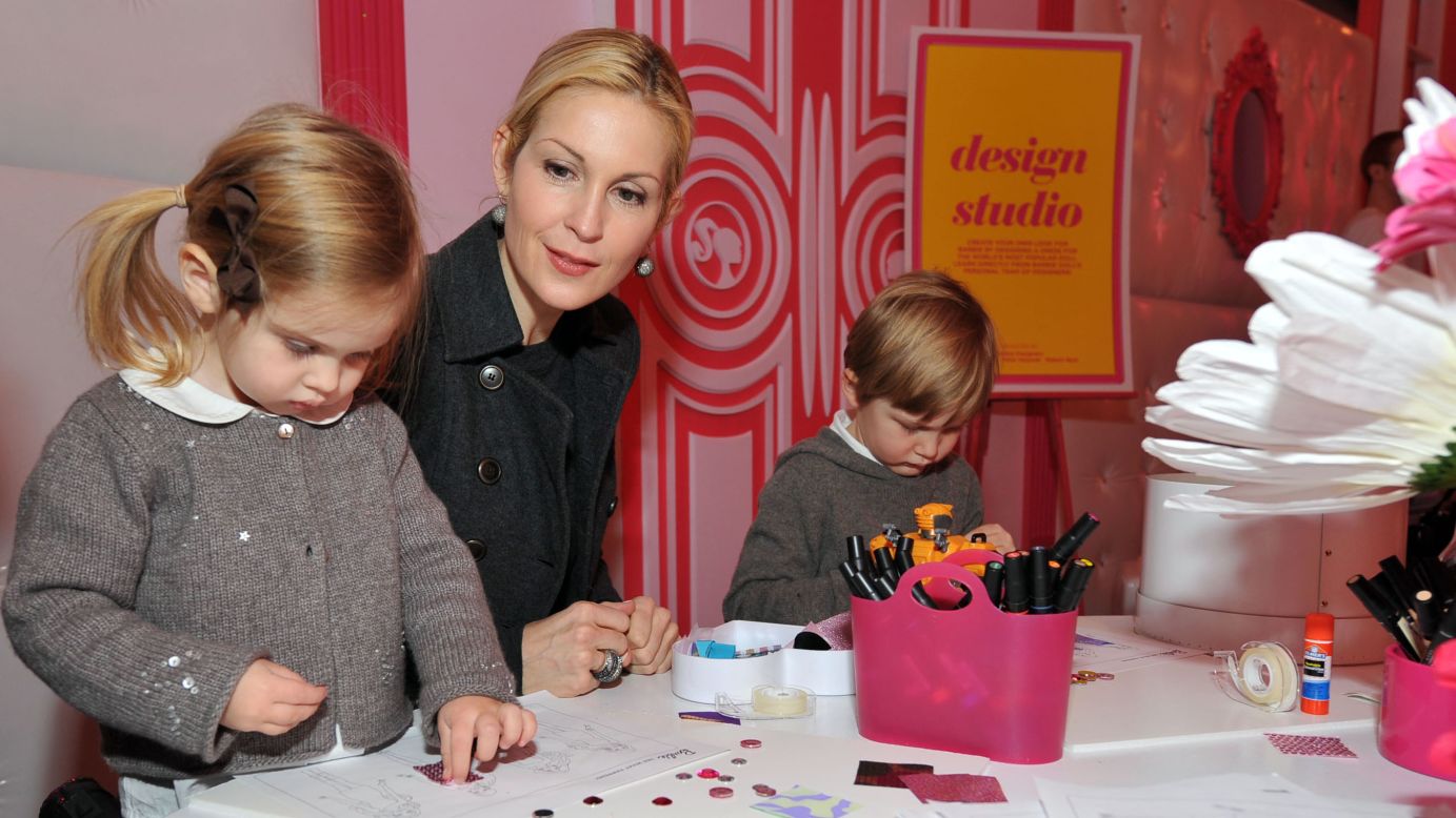 Actress Kelly Rutherford and her two children, Helena and Hermes, create designs at a New York Fashion Week event in 2012. 