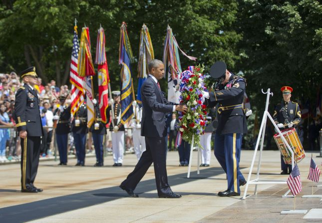 Obama attends a wreath-laying ceremony at the Tomb of the Unknowns in Arlington on May 25.
