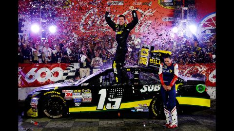 NASCAR driver Carl Edwards celebrates on his car Sunday, May 24, after winning the Coca-Cola 600 in Charlotte, North Carolina.