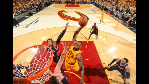 Cleveland's LeBron James throws down a dunk during the NBA's Eastern Conference Finals on Sunday, May 24. James had a triple-double -- 37 points, 18 rebounds and 13 assists -- to help the Cavaliers take a 3-0 series lead on the Atlanta Hawks.