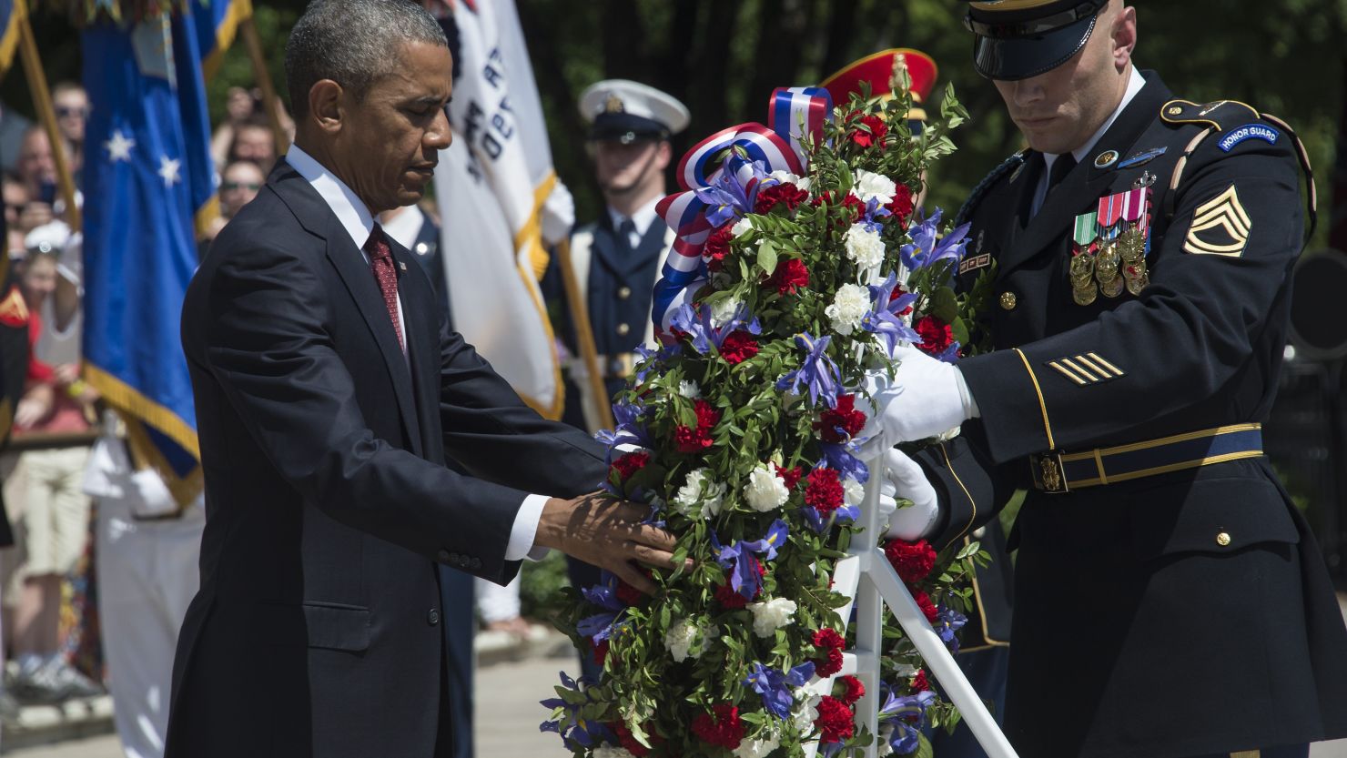 President Barack Obama lays a wreath at the Tomb of the Unknowns on Memorial Day 2015 at Arlington National Cemetery. 