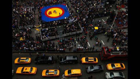 Wrestlers compete in New York's Times Square during the "Salsa in the Square" event on Thursday, May 21. The exhibition pitted wrestlers from the United States against wrestlers from Cuba.