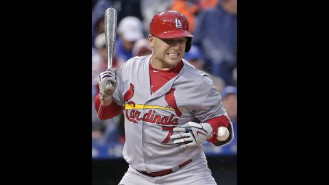 St. Louis outfielder Matt Holliday is hit by a pitch during a game in Kansas City, Missouri, on Saturday, May 23. Holliday came out of the game and missed the next day's contest because of the bruise he suffered on the play.