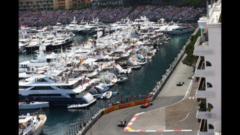 Spectators watch the Monaco Grand Prix from boats and grandstands during the Formula One race on Sunday, May 24.