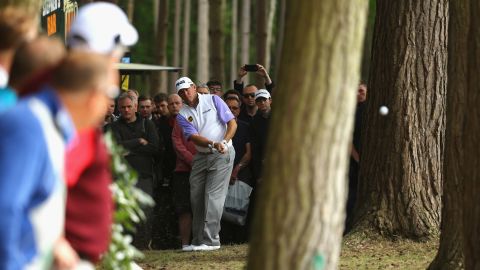 Lee Westwood plays a shot from the trees during the second round of the BMW PGA Championship on Friday, May 22. The European Tour event was held in Virginia Water, England.