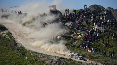 The car of Mads Ostberg and Jonas Andersson races down a hill in Porto, Portugal, on Saturday, May 23, during the second day of a World Rally Championship event.