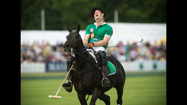 Britain's Prince Harry plays polo in Cirencester, England, on Sunday, May 24.