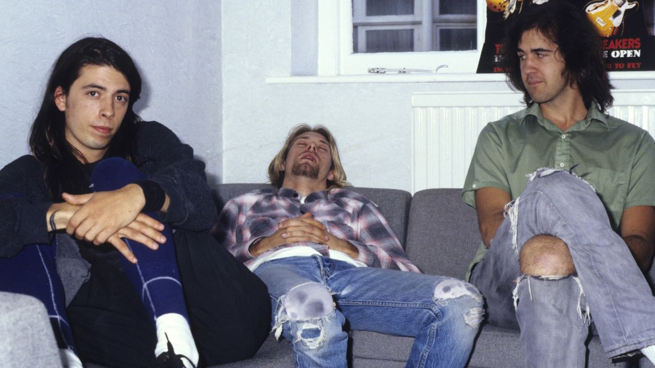 With a career spanning decades, Grohl first gained fame as the drummer for the iconic '90s band Nirvana. Band mates Kurt Cobain and Krist Novoselic pose with Grohl during a 1991 interview in London.