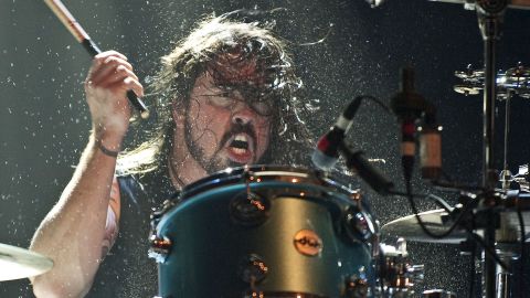Grohl performs with the supergroup he was part of called Them Crooked Vultures in 2009 in London.