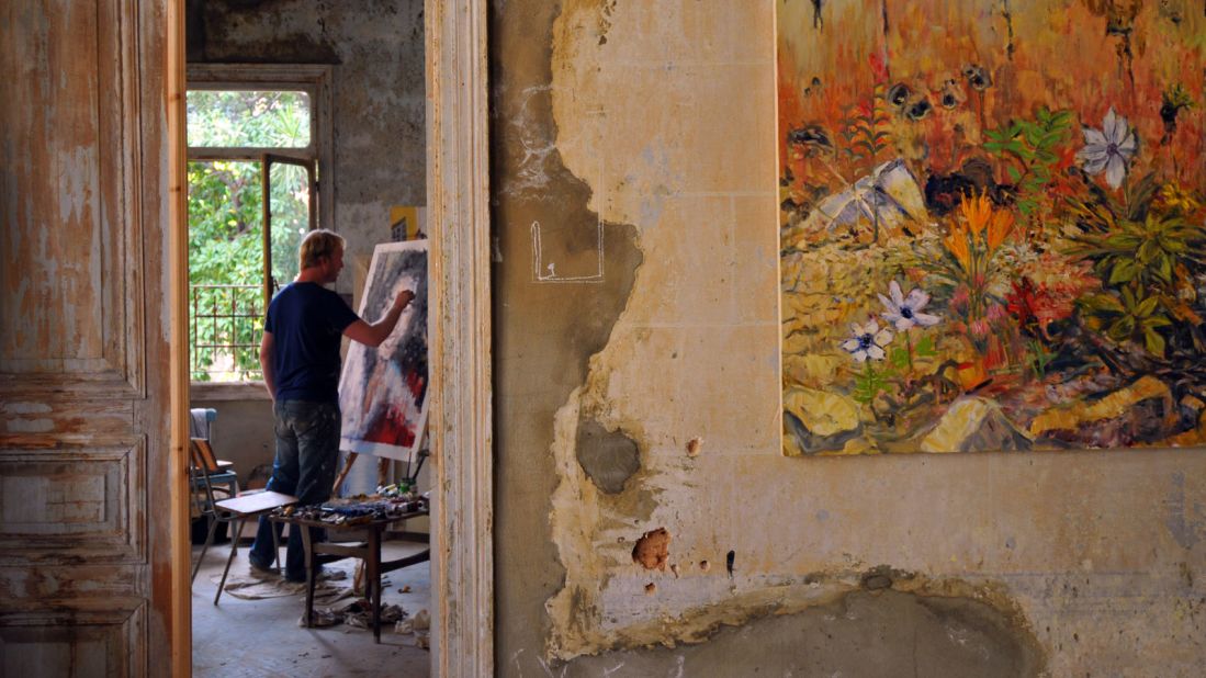 Painter Tom Young came across the crumbling house that would become Villa Paradiso as he was walking home one night. He struck a deal with its owners to use it as an exhibition space.