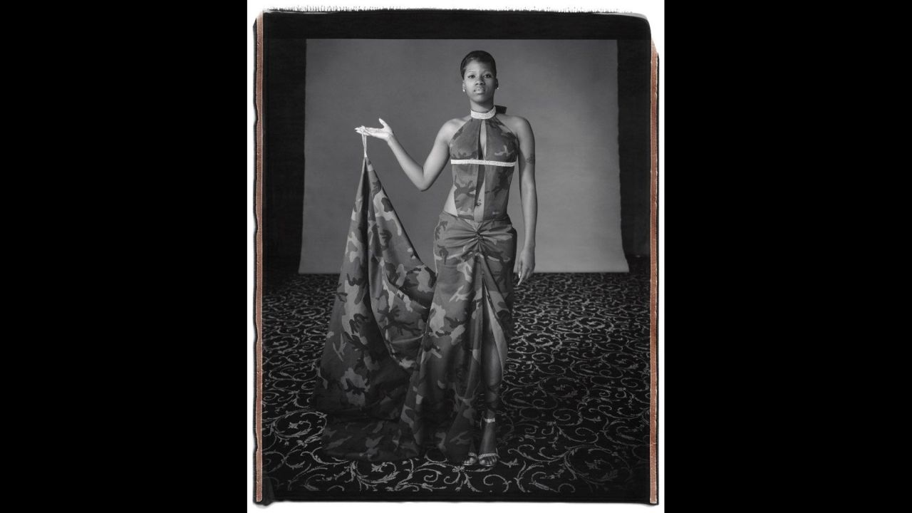 Taneya Hammer poses on prom night in Newark, New Jersey, in 2006. The photo is part of <a href="http://www.maryellenmark.com/books/titles/prom/index002_prom.html" target="_blank" target="_blank">Mary Ellen Mark's "Prom" series</a>, which became <a href="http://shop.getty.edu/products/prom-978-1606061084" target="_blank" target="_blank">a book in 2012</a>. Beyond projecting personal style, prom photos reflect socioeconomic and cultural values from an American rite of passage, the legendary documentary photographer <a href="http://www.cnn.com/2012/04/19/living/ireport-prom-photos/" target="_blank">told CNN in 2012</a>. <a href="http://money.cnn.com/2015/05/26/news/mary-ellen-mark/" target="_blank">Mark died Monday, May 25,</a> at the age of 75.