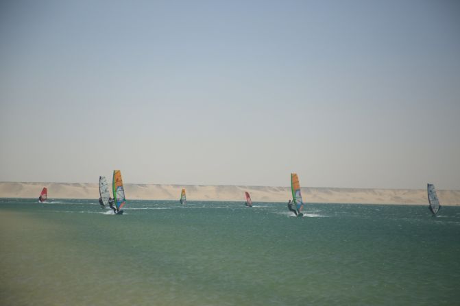 If you prefer a little less air-time but still want to be by the sea, Dakhla is also a superb place to get a bit of windsurfing in. The difference in temperature between the ocean and the Saharan desert creates a thermal wind, which usually travels at between 15 and 25 knots throughout the year. <a href="https://www.cnn.com/2015/05/28/business/gallery/kitesurfing-morocco/index.html" target="_blank">Read more on the Moroccan surfing hotspot.</a> 