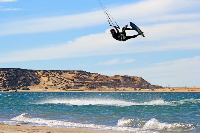 Kitesurfing is a watersport that is becoming increasingly popular around the world. Click through to find out why many enthusiasts are heading to a small town on the Atlantic to perfect their tricks, turns and grabs...