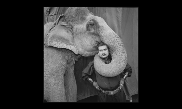 Ram Prakash Singh with his elephant Shyama, Great Golden Circus, Ahmedabad, India, 1990.