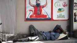 An Indian man rests in the shade on a hot summer day in Hyderabad on May 26, 2015. More than 430 people have died in two Indian states from a days-long heatwave that has seen temperatures nudging 50 degrees Celsius (122 degrees Fahrenheit), officials said May 25.