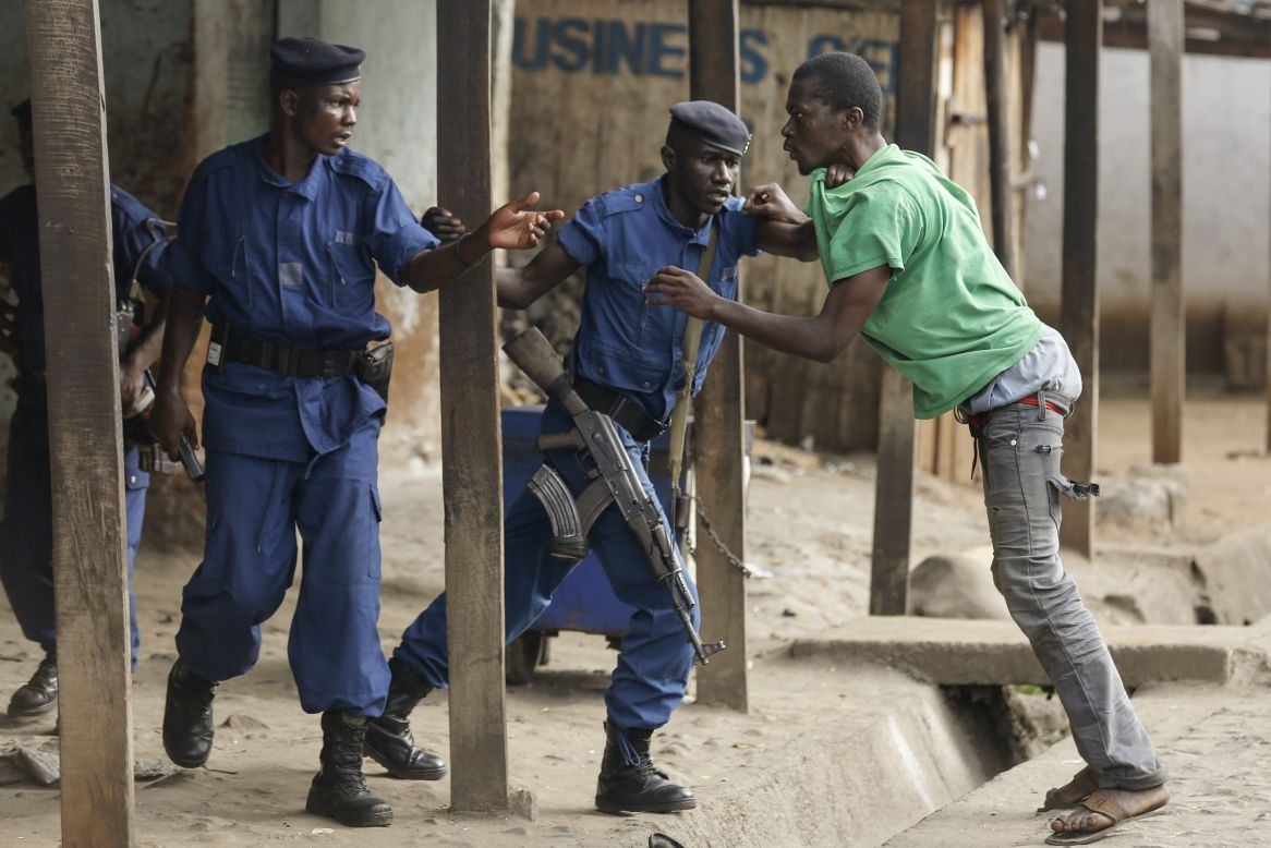 Police detain a protester at an anti-government demonstration in Bujumbura on May 26.