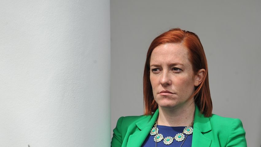 White House Communications Director Jen Psaki listens to U.S. President Barack Obama makes a statement at the White House in Washington, D.C., on April 2, 2015 after a deal was reached on Iran's nuclear program.