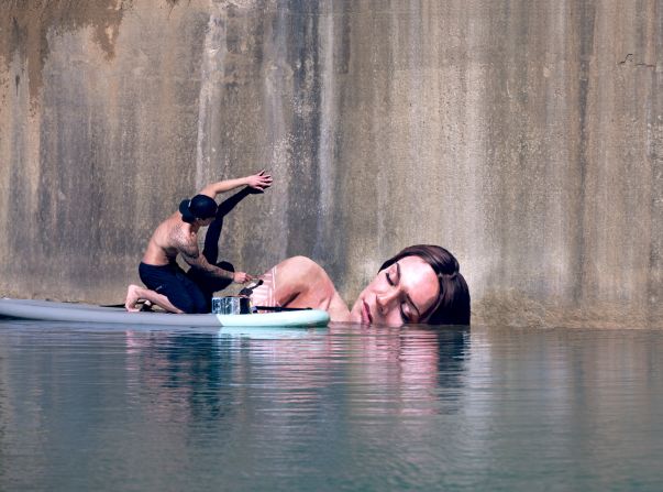 From his floating studio, a paddle board, Sean Yoro creates stunning portraits of women, whose lifelike features barely escape the waterline. <br /><br />The artist, also known as <a href="index.php?page=&url=http%3A%2F%2Fwww.hulaaa.com" target="_blank" target="_blank">Hula</a>, is based in New York City but is originally from Hawaii: "I grew up on Oahu, where I was surrounded with everything nature had to offer," he told CNN. "The ocean was my playground and art didn't enter my life until my later teenage years."