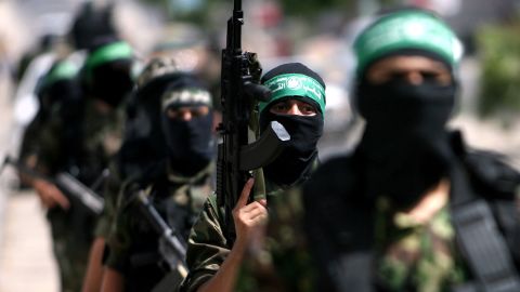 Members of Hamas' military wing, Izzedine al Qassam, parade in southern Gaza in May 2014.