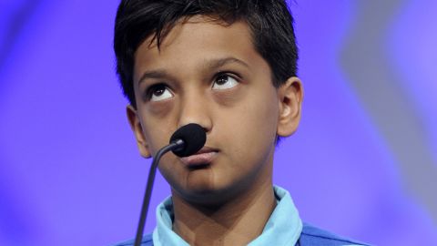 Jairam Hathwar, 12, of Corning, New York, spells the word "harpsichord." Spelling bees can be a prestige activty for Indian parents.