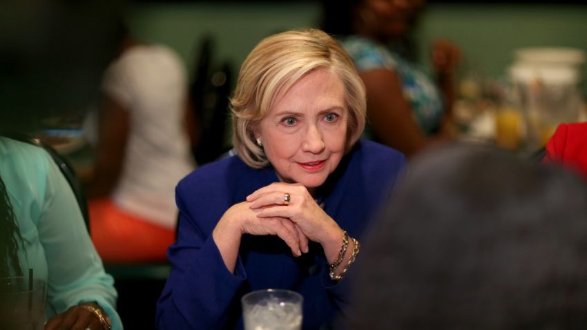 Democratic Presidential Candidate Hillary Clinton sits in on a round table discussion as she visits the Kikis Chicken and Waffles restaurant on May 27, 2015 in Columbia, South Carolina.