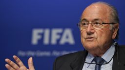 Caption:FIFA president Joseph Blatter gestures during a press conference following an executive meeting on March 30, 2012 at the World football governing body's headquarters in Zurich. AFP PHOTO / FABRICE COFFRINI (Photo credit should read FABRICE COFFRINI/AFP/GettyImages)