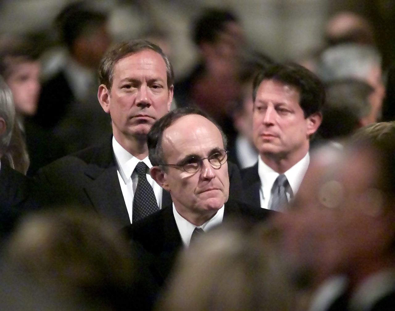 Pataki and his wife Libby currently reside in Garrison, New York. They have four children, Emily, Teddy, Allison and George Owen. In this photo, Pataki, left, then-New York City Mayor Rudy Giuliani, center, and then-U.S. Vice President Al Gore, right, watch the procession of religious leaders walk into St. Patrick's Cathedral during the funeral for John Cardinal O'Connor May 8, 2000 in New York City.