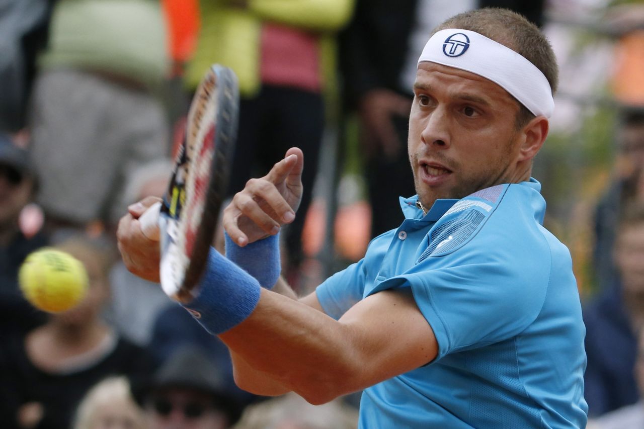 Gilles Muller, 32 and a former junior No. 1, completed a five-set comeback win over Paolo Lorenzi. 