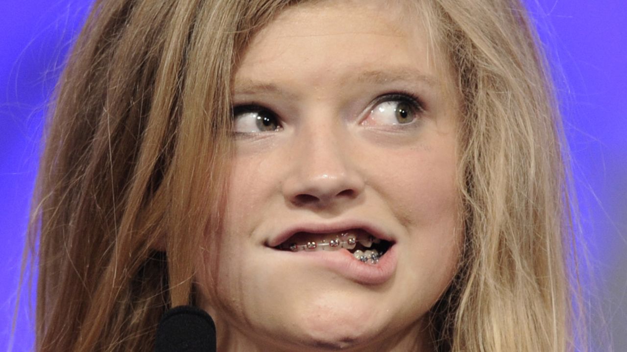 Hailey Hogenson, of Ludington, Michigan, reacts to misspelling the word "intussusception" on Wednesday, May 27.