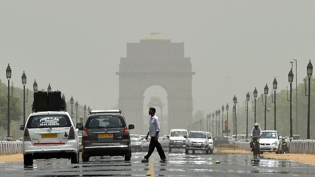 Few people brave the streets near the India Gate in New Delhi on Thursday, May 28.