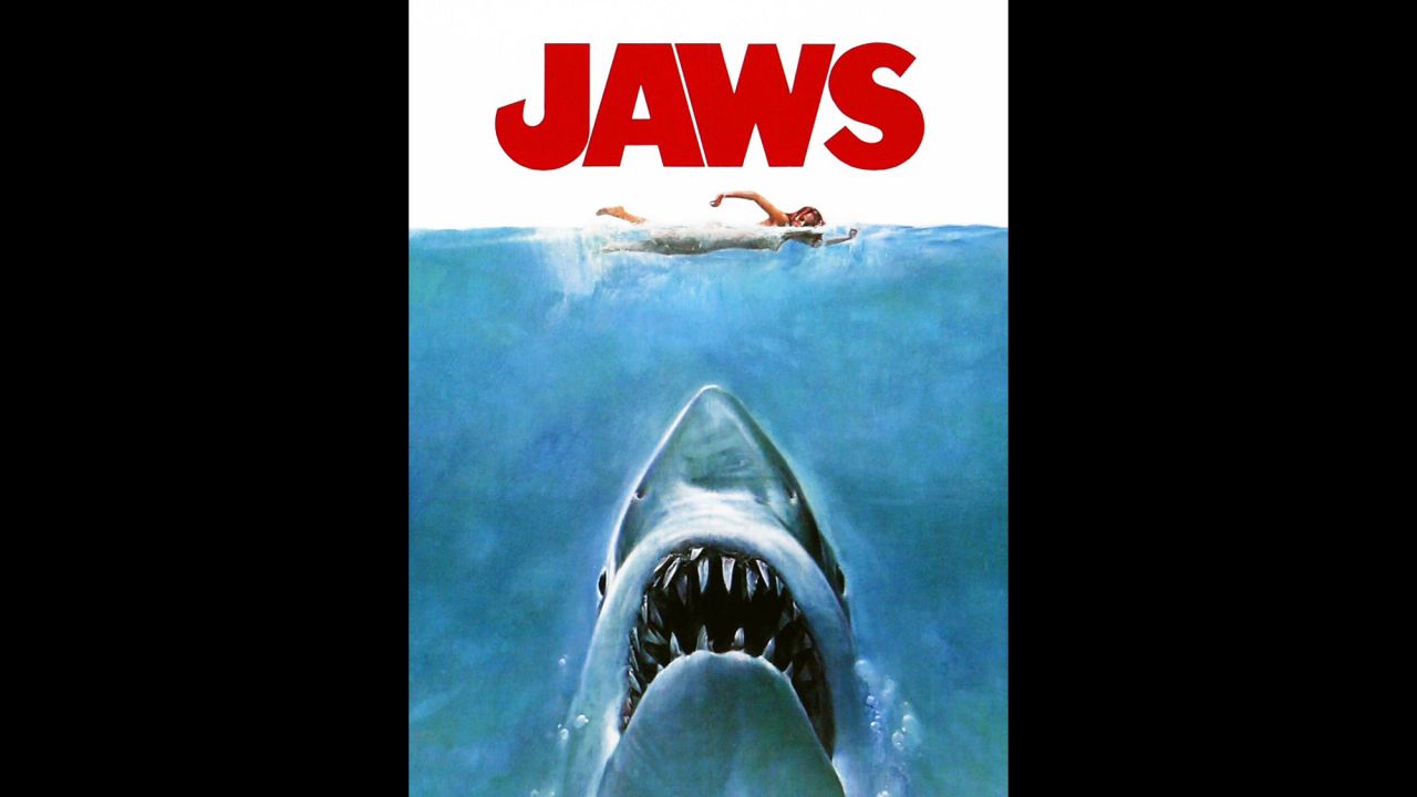 Observers credit some of "Jaws'" popularity to its terrifying poster, which showed a monstrous shark rising from the deep to attack an unsuspecting swimmer.
