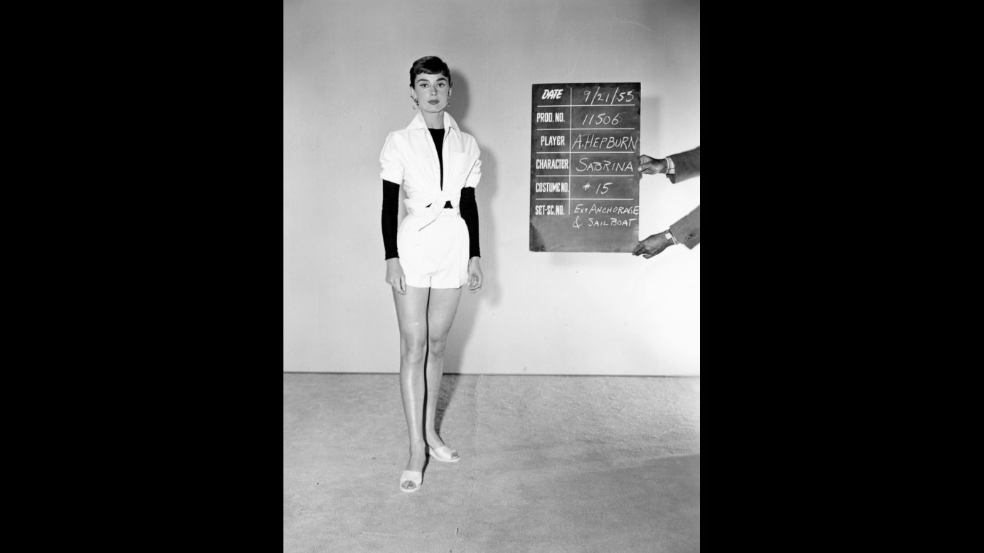 Hepburn stands for a wardrobe test shot for the film "Sabrina," which was released in 1954. Costume designer Edith Head won an Academy Award for the film, and it is hailed as the start of a longtime collaboration between Hepburn and designer Hubert de Givenchy.