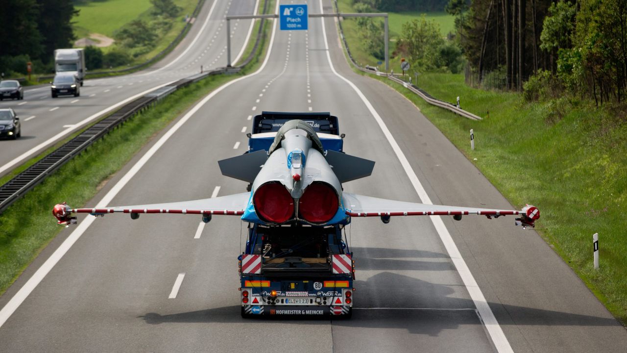 A damaged Eurofighter jet is hauled on the back of a truck near Plech, Germany, on Thursday, May 28. 