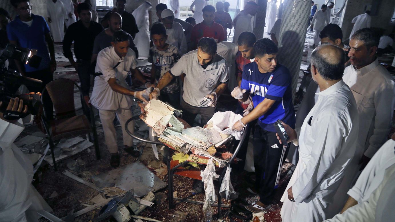 People search through debris after <a href="http://www.cnn.com/2015/05/23/middleeast/saudi-arabia-mosque-blast/index.html" target="_blank">an explosion at a Shiite mosque</a> in Qatif, Saudi Arabia, on Friday, May 22. The militant group ISIS claimed responsibility for the attack, which killed 21 people.