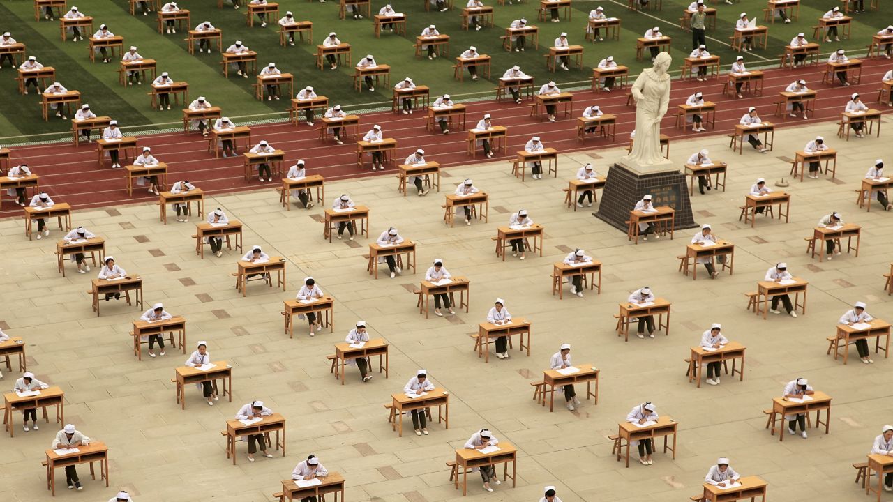 Hundreds of nursing-school students take an exam outside of a vocational college in Baoji, China, on Monday, May 25.