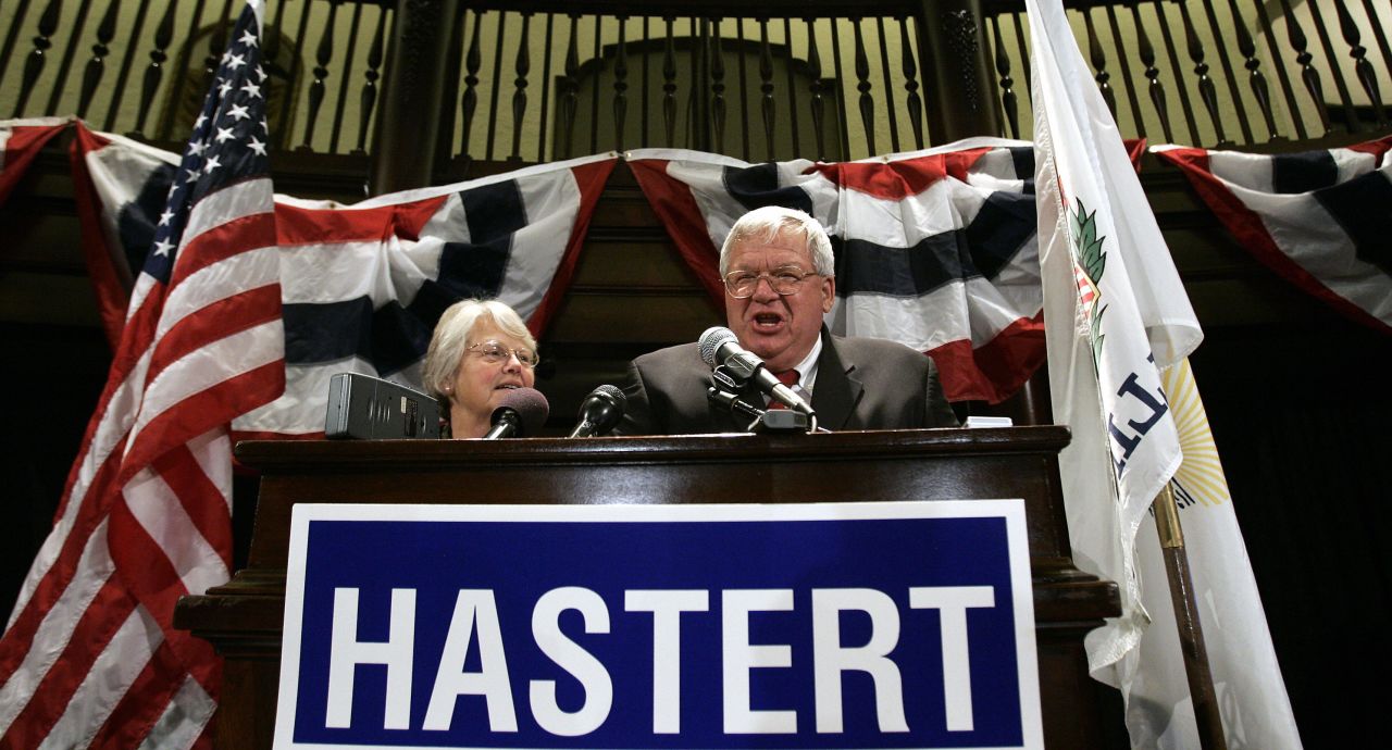 Hastert celebrates his re-election to an 11th term in Congress on November 7, 2006, with his wife, Jean, at a victory party in the Baker Hotel in St. Charles, Illinois. Republicans lost their majority in the House, meaning Hastert lost his position as speaker when the new Congress started on January 4, 2007.