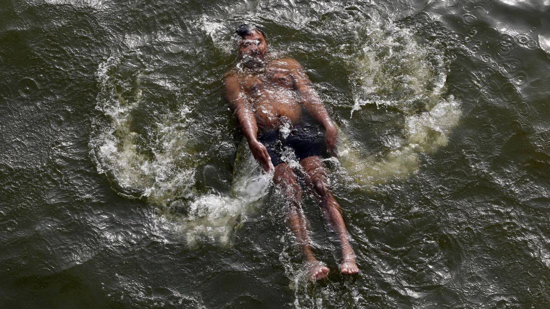 A man swims in the River Yamuna in Allahabad, India, on May 27.