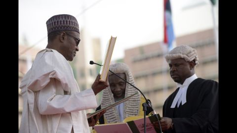 Buhari takes the oath of office at Eagle Square in Abuja on May 29.