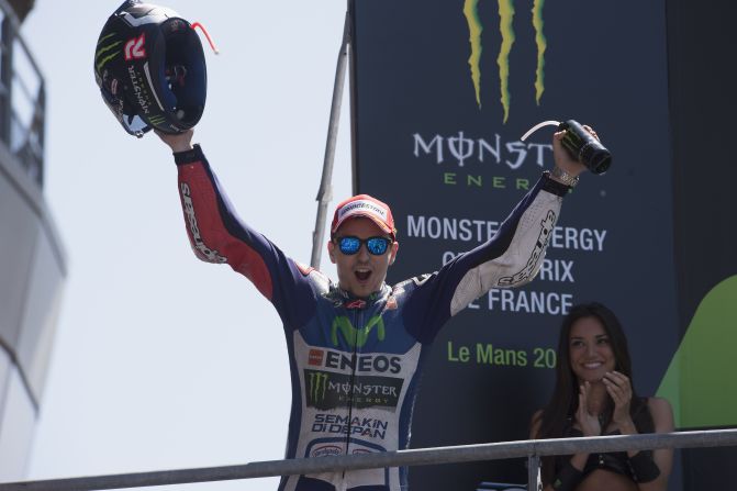 Lorenzo has enjoyed a good start to the 2015 MotoGP season and sits in second place in the riders' standings, just 25 points behind Valentino Rossi. Here the Spaniard celebrates his win in France, the second of two consecutive victories.
